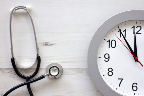 stethoscope and clock